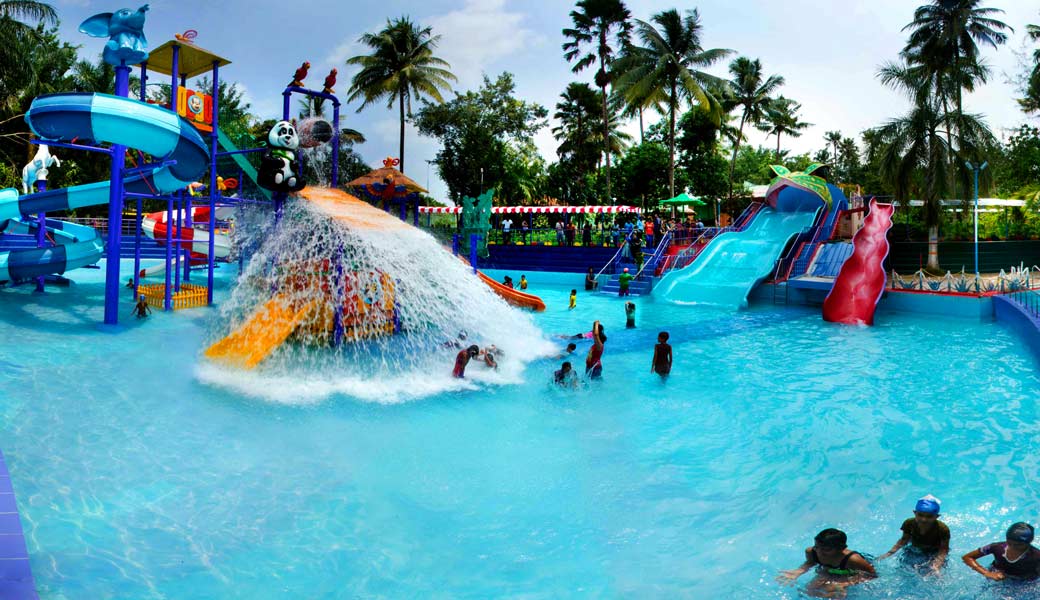 Visitors enjoying the rain dance attraction at Dream World